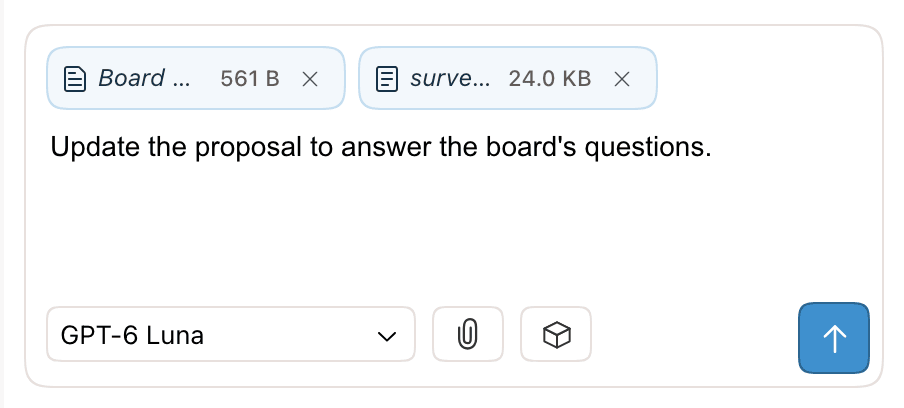 The chat input with two attachment chips, pasted board notes and a PDF, each with its size, and a typed request