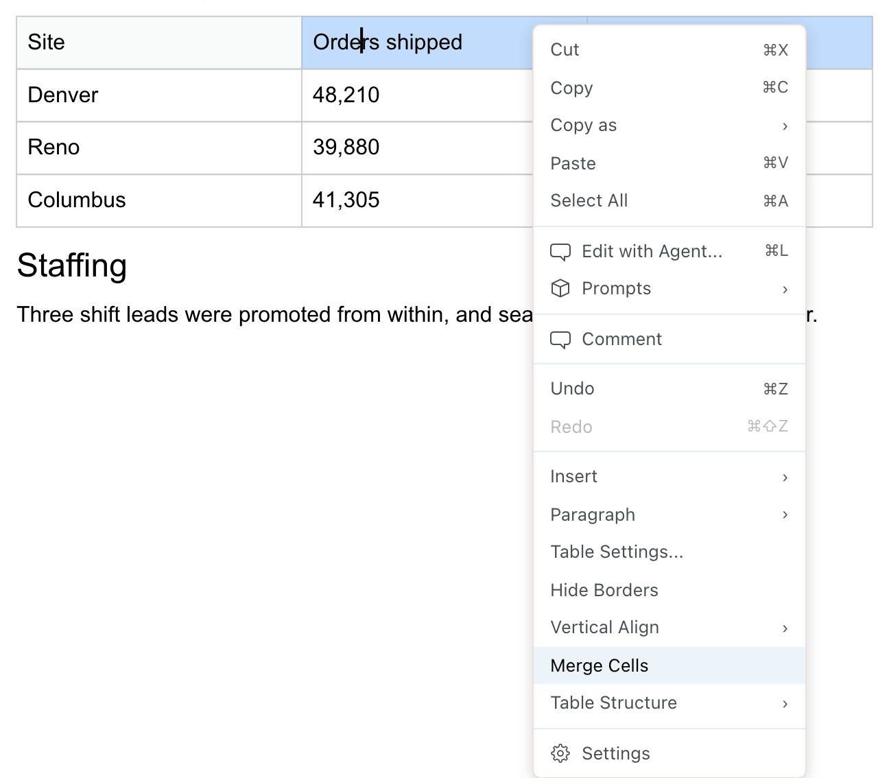 Two header cells selected in a table, with Merge Cells highlighted in the right-click menu